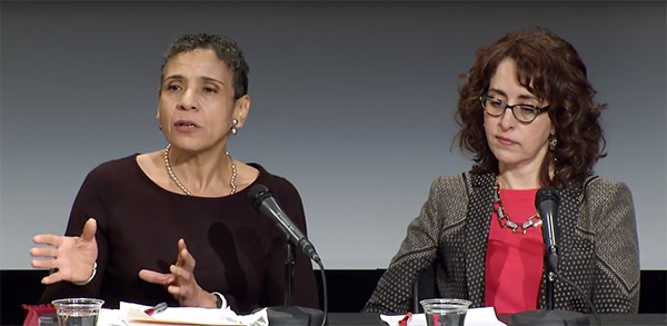 Women speaking on panel