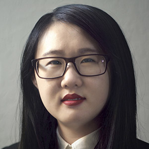 PhD student Xuanzi Qin wearing glasses