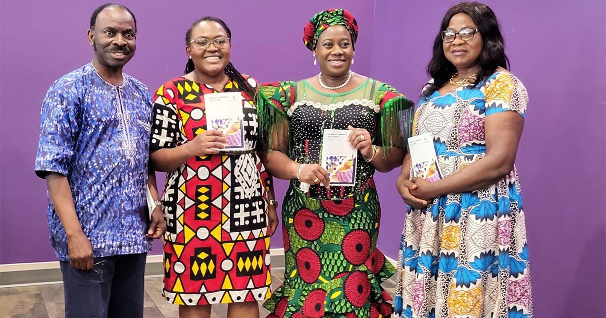 people standing and smiling